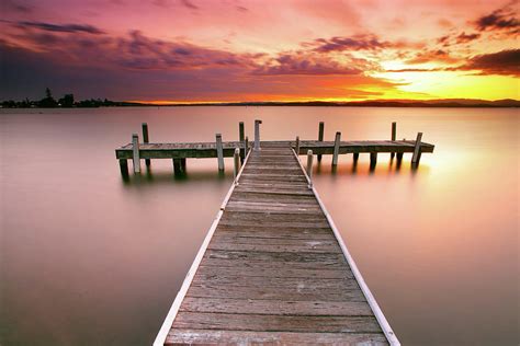 Pier In Lake Macquarie At Sunset Photograph By Yury Prokopenko Fine