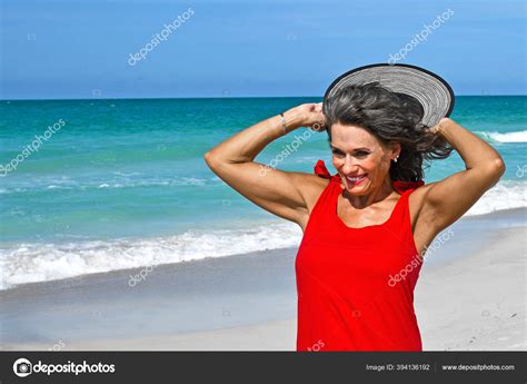 Beautiful Mature Woman Wearing Red Summer Dress Beach Stock Photo By