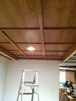 It's a grid system that holds tiles in place on the ceiling. Found this awesome idea for a drop ceiling remodel! So ...