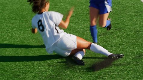 Female Soccer Player Slide Tackles Opponent Stock Footage Video 100 Royalty Free 12304748