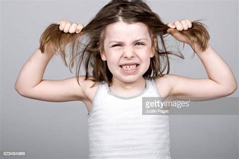Girl Pulling Hair Photos And Premium High Res Pictures Getty Images