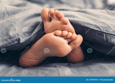 Female Beautiful Feet Under Blanket In Bed Stock Image Image Of Adult