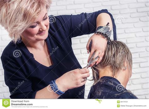 Hairdresser Cutting Hair With Scissors Stock Image Image Of