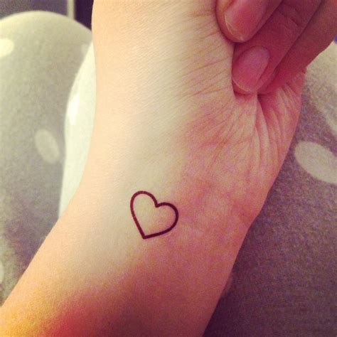 Amazing Tiny Heart Tattoo On Wrist