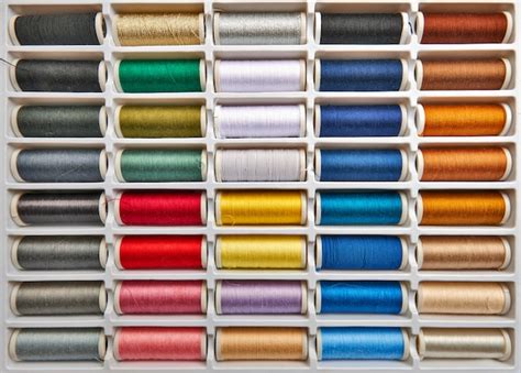 Premium Photo Sewing Threads Multicolored Background Closeup
