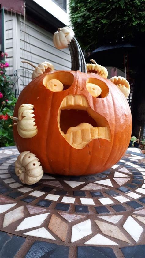 20 Crazy Creative Pumpkin Carving Ideas The Unlikely Hostess Pumpalykta Halloweenidéer