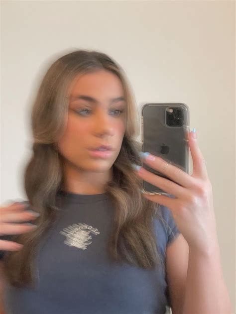 blurry mirror selfie of blonde girl wearing navy blue t shirt selfie t shirts for women mirror