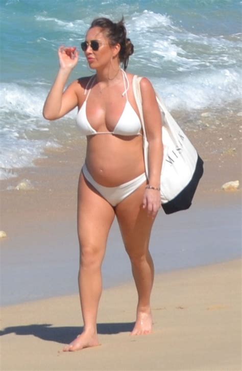 Pregnant Lauryn Goodman Is Seen In A Bikini On The Beach Photos