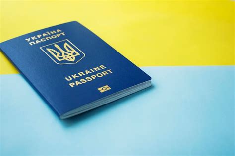 Premium Photo Passport On The Background Of The Ukrainian Flag With