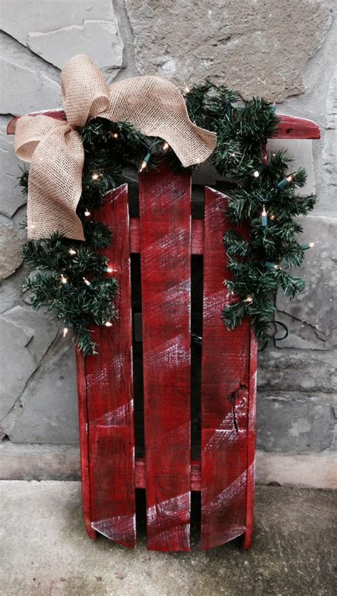 Decorating Old Wooden Christmas Sleds