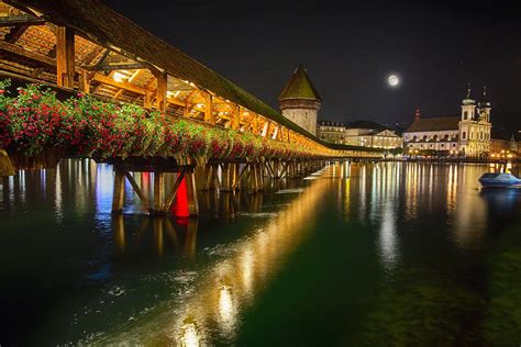 Scenic Night View Of The Chapel Bridge In Old Town Lucerne Photograph