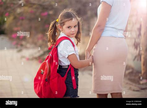 Back To School Parent Care Concept Pupil And Mother Going To School