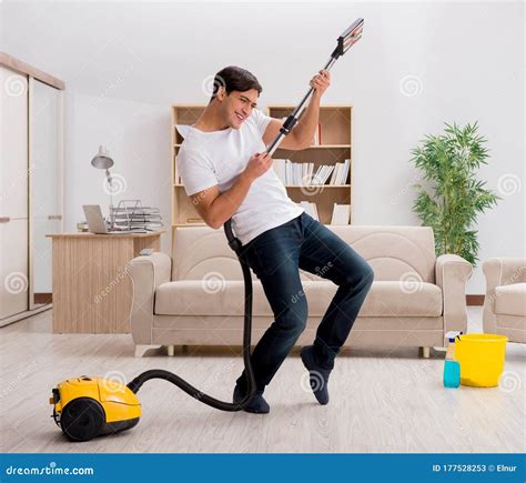 Man Cleaning Home With Vacuum Cleaner Stock Image Image Of Household Clean 177528253