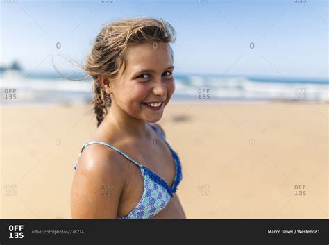 Portrait Of Smiling Girl Wearing Bikini Top On The Beach Stock Photo My Xxx Hot Girl