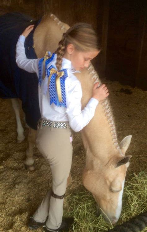 Beautiful Braids And Equestrian Hair Bows On A Young Rider And Her Pony