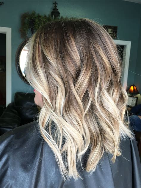 Blonde and brown hair gives a timeless shade that suits those with light to medium skin. 2020 Latest Brown Blonde Balayage Lob Hairstyles