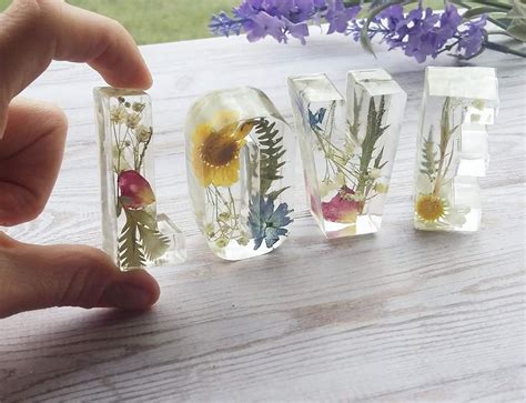 Large vertical or horizontal storage sheds are ideal for keeping garden tools and accessories out of your way. My new resin flower letters! | Resin jewelry diy, Resin ...