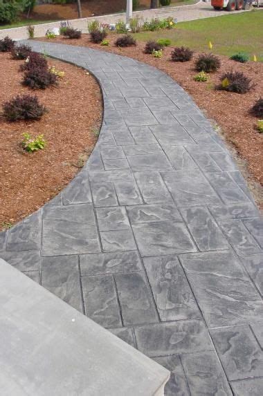 A square concrete slab is standard, but you can add curves around your concrete patio with the help of pavers. More stamped concrete @ Do it Yourself Home Ideas | Walkway landscaping, Stamped concrete patio ...