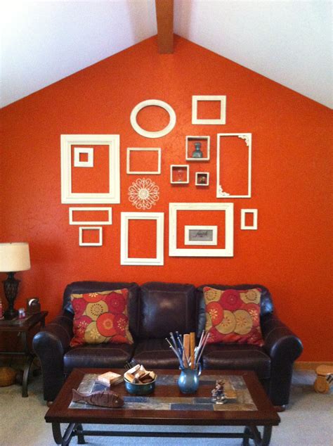 I think it's coming together. My living room wall inspired by Pinterest. Burnt orange ...