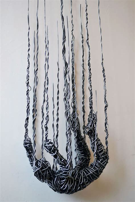 See more ideas about sculptures, wire sculpture, wire. Artist Uses Recycled Wire to Create Stunning Fluid ...