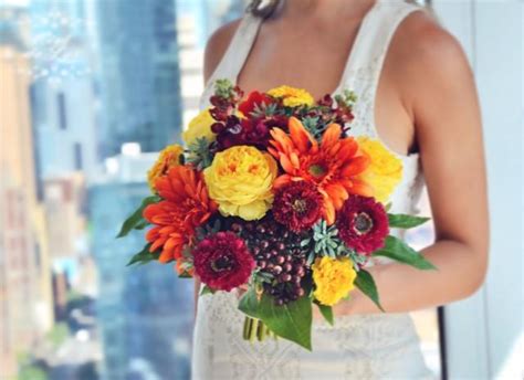 Mixing silk and real blooms for your wedding is the perfect way to have the glamour without the challenges some blooms offer. Fall Wedding Bouquet, Orange Bridal Bouquet, Fall Flowers ...