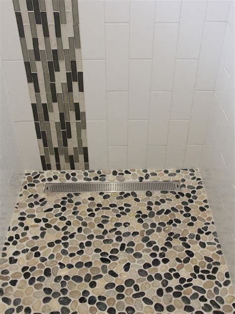 Maybe you would like to learn more about one of these? Neutral and Black Mosaic Pebble Shower Floor With Vertical ...