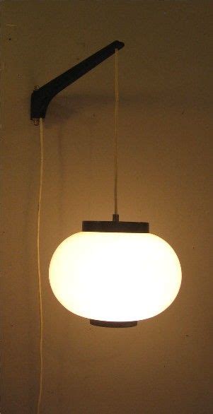 Hanging wall lights for bedroom. hanging pendant light based off a wall bracket, could work ...