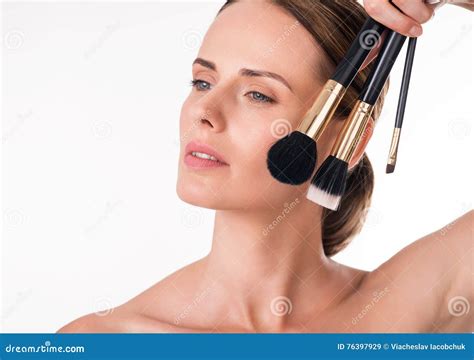 Attractive Young Woman Using Makeup Brushes Stock Image Image Of