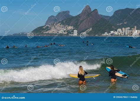 Two Female Surfers At Ipanema Beach In Rio De Janeiro Editorial Stock