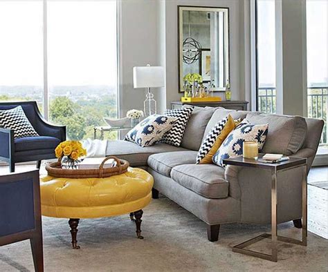 Light up your living space with metallic shine and watch your black and grey living transform your living room with these bold and beautiful blue and grey living room ideas. Gray and yellow living room with grey wall paint color ...