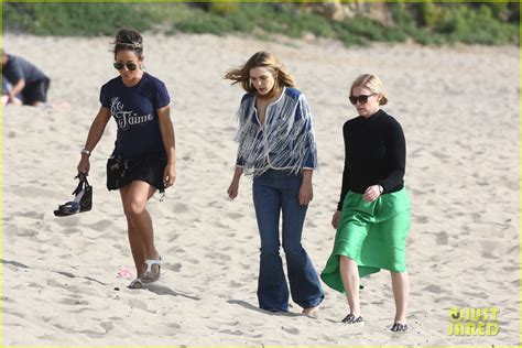 Elizabeth Olsen Hits The Beach For Photo Shoot After New Avengers TV