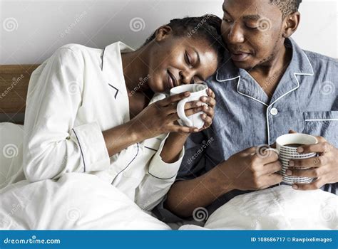 A Couple Having Coffee In Bed Stock Image Image Of Breakfast Having