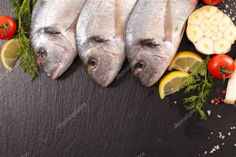 Raw Fish With Ingredients — Stock Photo © Studiom 137120226