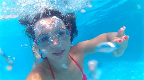 Pool Day Underwater Swimming With Glasses And Blowing Bubbles