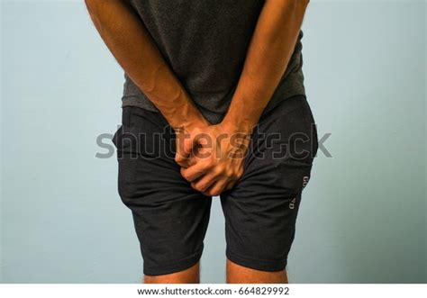 Man Hands Holding His Crotch He Stock Photo 664829992 Shutterstock