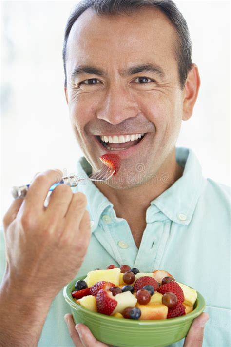Middle Aged Man Eating Fresh Fruit Salad Stock Photo - Image of ...
