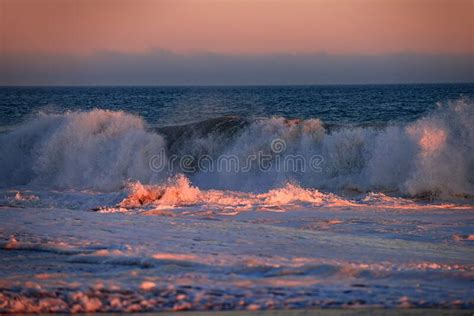 Beach Sunrise Over The Tropical Sea Colorful Sunset With Wave Splashes