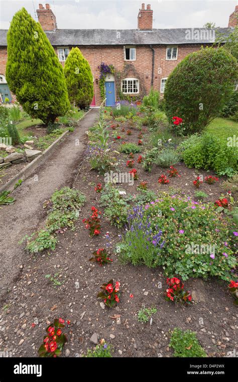 Traditional Victorian English Terraced Cottage Garden Laid Out With