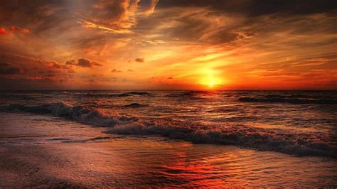 Glorious Red And Orange Sunset At The North Sea Wallpaper Backiee