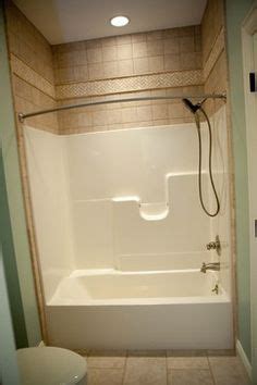 I cleaned then scored the tile with a diamond hole saw drill bit used for tile. I want to add tile above our shower surrounds! | Shower ...