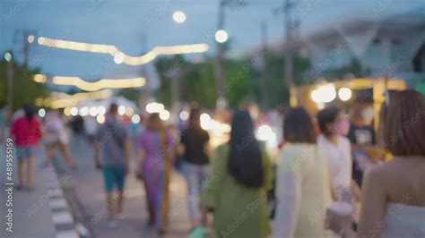 Blur People Walking Street Night Market With Colorful Bokeh Light
