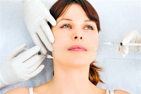 Woman Receiving An Injection Of Botox Stock Photo Image Of Listening