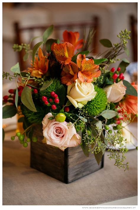 Bring out these fall flower arrangements and centerpieces to celebrate autumn. Wedding centerpiece- orange-reds-pink www ...