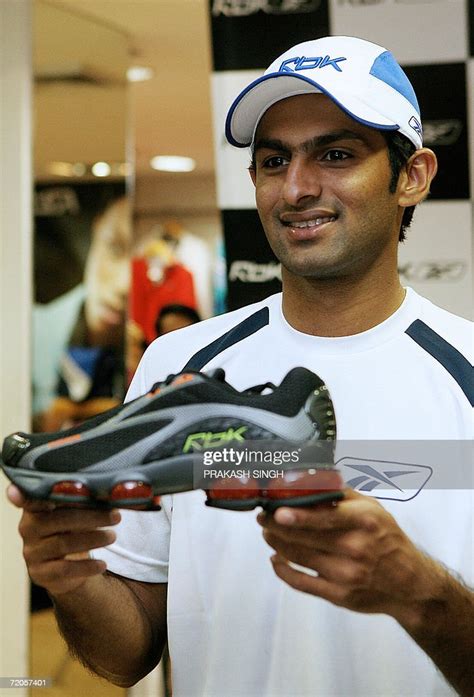 Pakistan Cricketer Shoaib Malik Poses With Reebok Actuator Shoes In