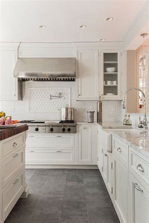 Home improvement reference related to kitchen floor tile ideas with white cabinets. Creamy white cabinets paired with Supreme White Quartzite ...