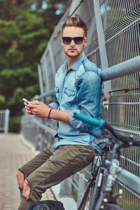 Handsome Hipster With Stylish Haircut In Sunglasses Resting After