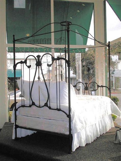 Nope, wrought iron beds are a classic and will always have a place in the home. cathouse antique iron beds vintage bed