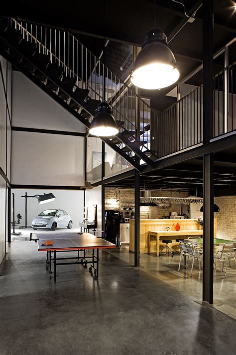 Large Industrial Style Focusse Lighting Inside The Pblok Office Design