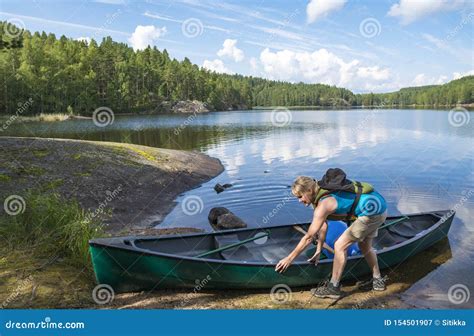 Woman Canoeing On The Lake Stock Image Image Of Backpacker 154501907