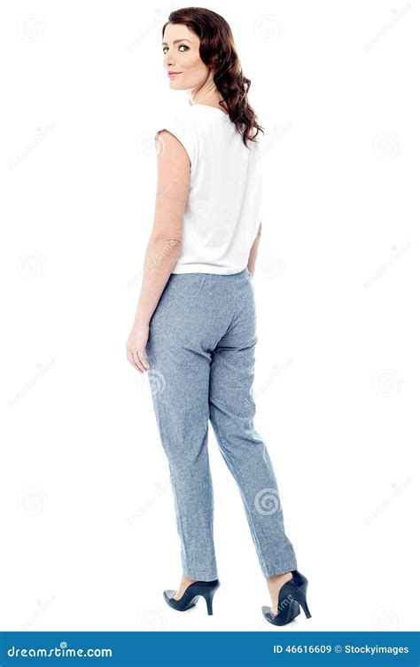 Woman Looking Back While Walking Forward Stock Image Image Of Back